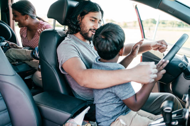 istock Road adventure - family with kids using the car 1357540310