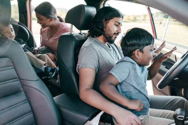 istock Road adventure - family with kids using the car 1357540314