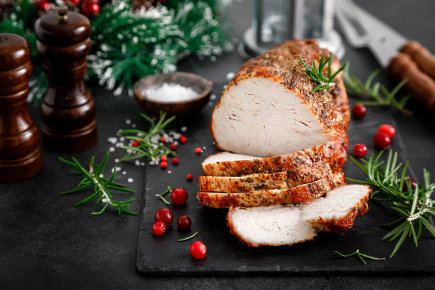istock Christmas turkey ham roasted for festive dinner on black background 1357545092