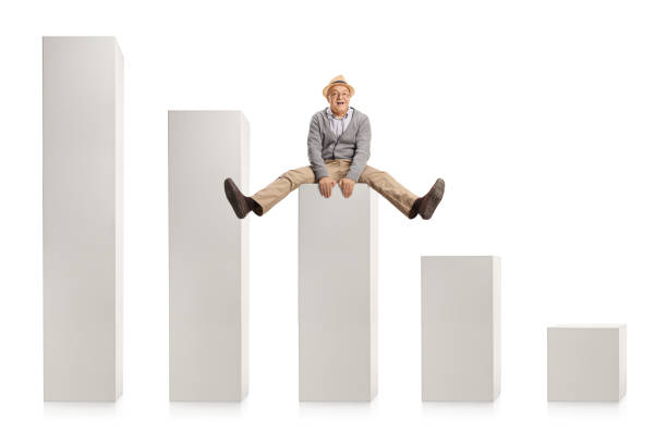 istock Happy elderly man sitting in the middle of a graph chart 1357548199