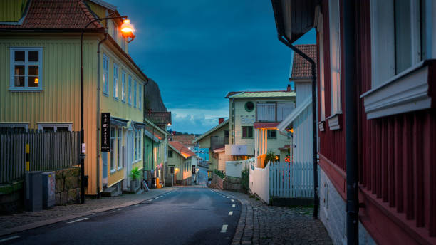 Street in the village of Fjällbacka at night Street in the village of Fjällbacka at night, on the west coast of Sweden västra götaland county stock pictures, royalty-free photos & images