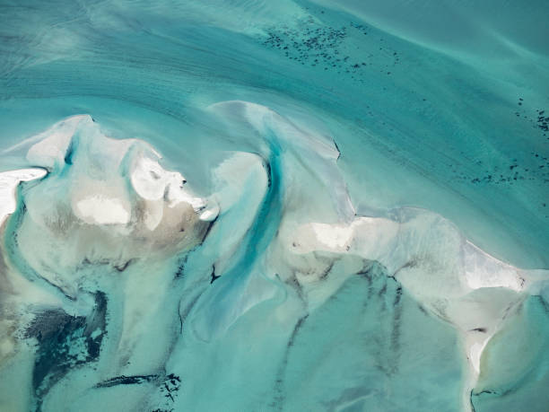 istock Aerial view of water and sand patterns 1357549962