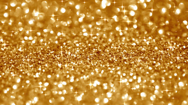 istock Sparkling golden festive background with sequins 1357550095