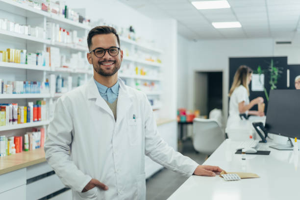istock Portrait of a handsome pharmacist working in a pharmacy 1357551761