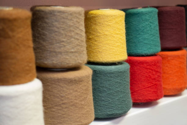 istock Many multi-colored bobbins of yarn. Knitting. 1357552665