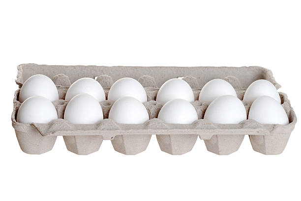 one dozen eggs isolated one dozen eggs egg carton stock pictures, royalty-free photos & images