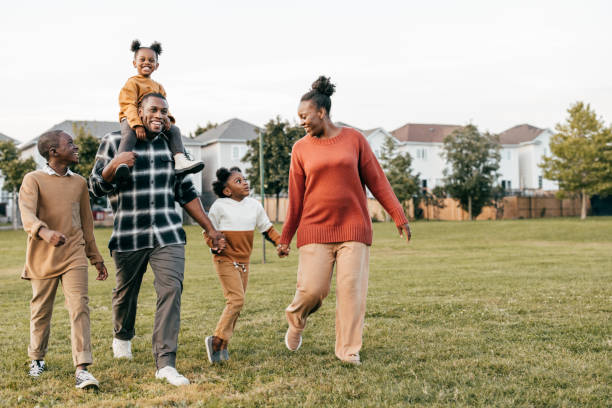 istock Family enjoying springtime outdoors with kids 1357554904