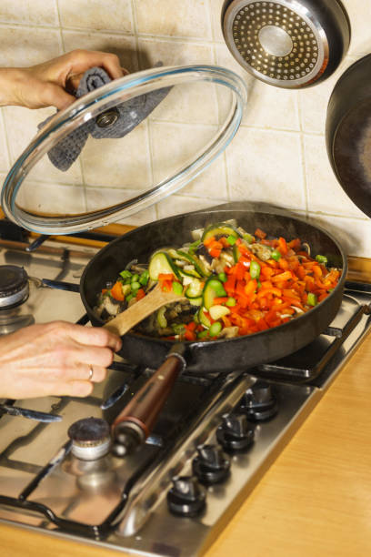 istock Chopped vegetables on frying pan 1357555062