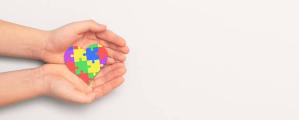 istock Autism spectrum with puzzle concept 1357556098