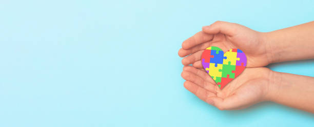 istock Autism spectrum with puzzle concept 1357556109