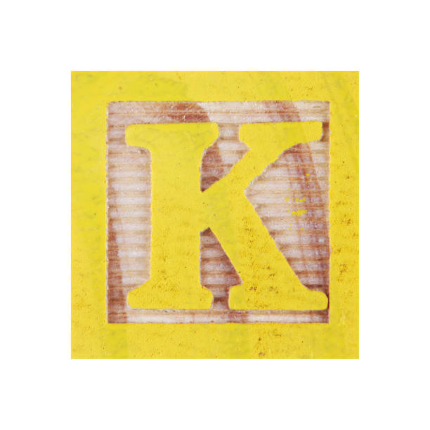 istock Letter K childs wood block on white with clipping path 1357557460