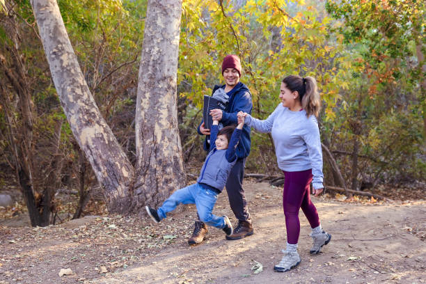 istock Family hiking with small children 1357558725