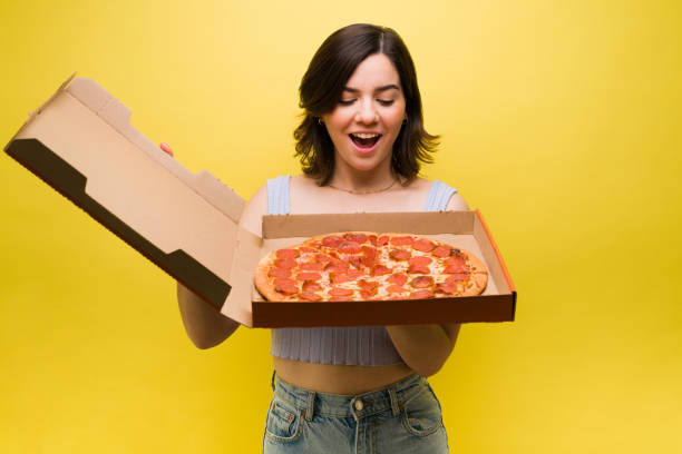 istock Cheerful woman happy for pizza 1357558893