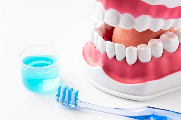 istock Image of using mouthwash to prevent bad breath 1357558904