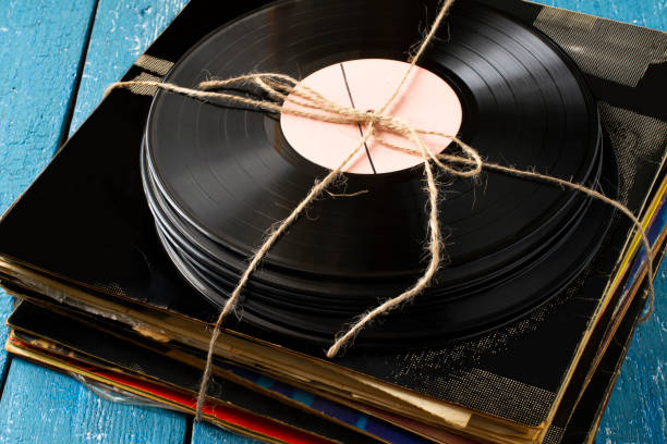 istock Stack of old vinyl records tied with twine 1357558906