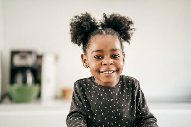 istock Smiling toddler in the kitchen 1357560084