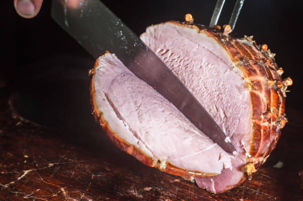 istock Traditional Sliced Honey Glazed Ham Ready for the Holidays,Christmas concept,selective focus and copy space 1357564302