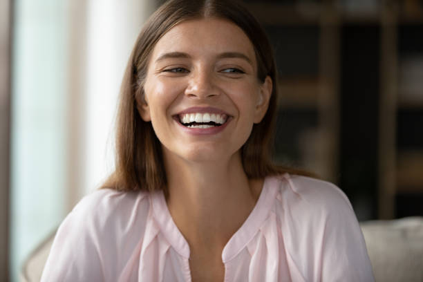 istock Happy young woman holding video call conversation. 1357564397
