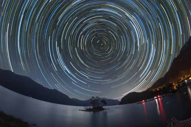 Startrails over sea and mountains, Furry Creek, BC, Canada