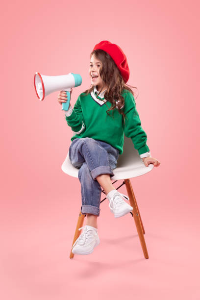 istock Little movie director with loudspeaker 1357570104