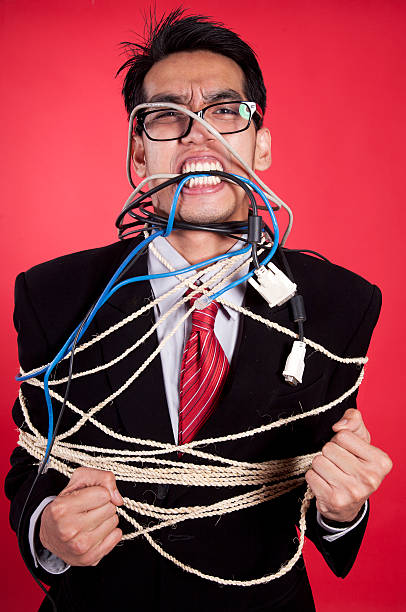 istock Angry businessman all tied up 135757123