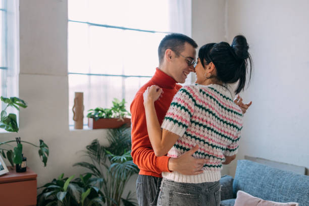 istock A Young Couple Dancing In The Living Room 1357572976