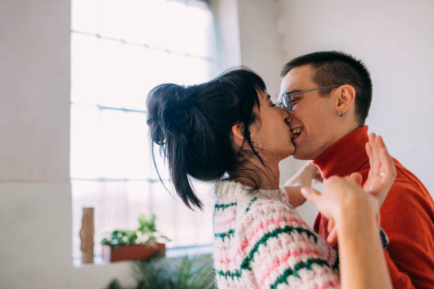 istock A Young Man Passionately Kissing His Girlfriend 1357572981