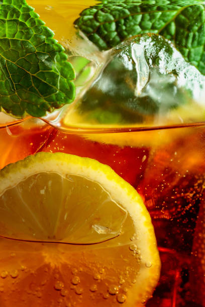 istock Carbonated drink with mint and lime slices. 1357576678