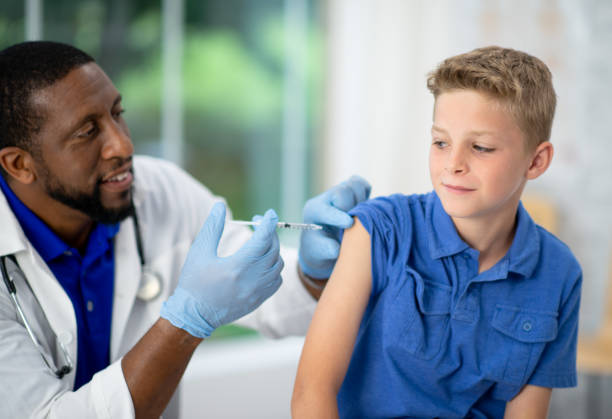 istock Apprehensive Young Patient Receiving a Vaccine 1357576910