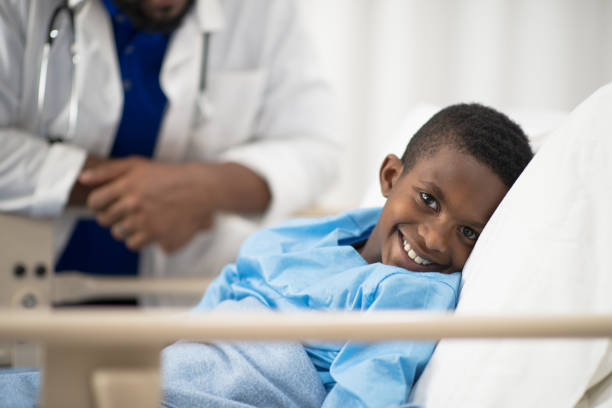 istock Doctor Talking with a Young Patient 1357577149