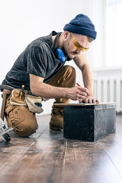 istock Circular Saw, carpenter using a circular saw for wood. 1357577242