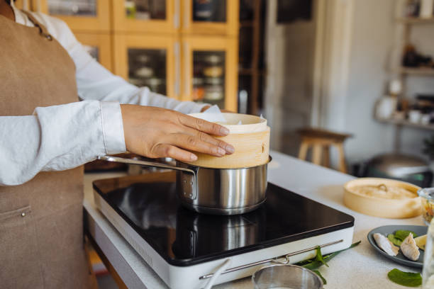 istock An Anonymous Woman Preparing Dumpling Gyoza in her Kitchen 1357580633