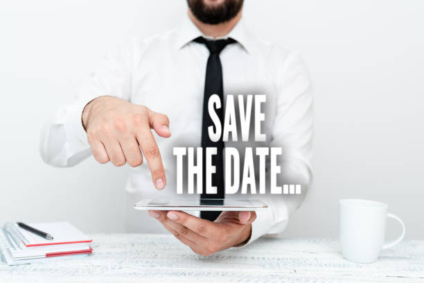 istock Hand writing sign Save The Date. Business idea remember specific important days or time using calendar Presenting Communication Technology Smartphone Voice And Video Calling 1357580659