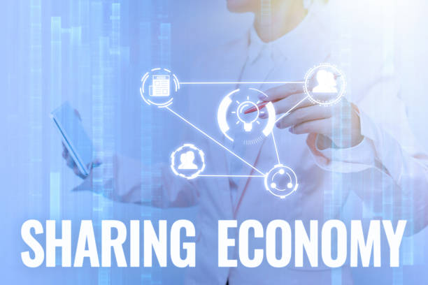 istock Text showing inspiration Sharing Economy. Business overview economic model based on providing access to goods Lady In Uniform Touching And Using Futuristic Holographic Technology. 1357580751