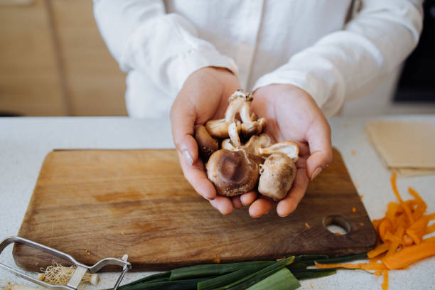 istock An Anonymous Woman Preparing Healthy Meal in her Kitchen 1357580924