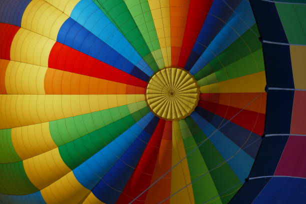 istock Symmetrical pattern of colorful hot air balloon viewed from below 1357584608