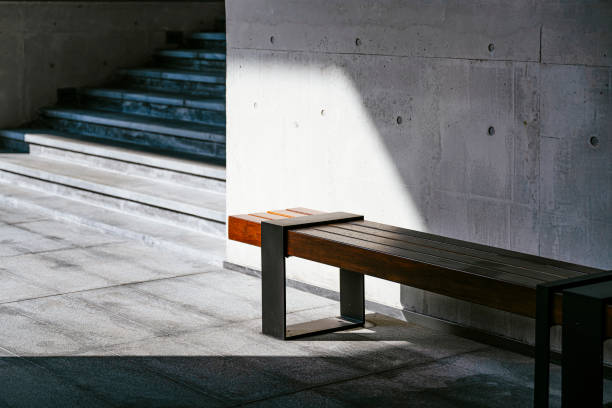 A wooden stool in the sun