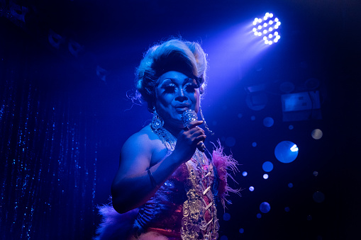 Drag queen Srimala, a contestant on Drag Race Thailand, does a singing and dancing performance at a bar in Silom Soi 4, Bangkok's infamous LGBTQ district, in Bangkok, Thailand.