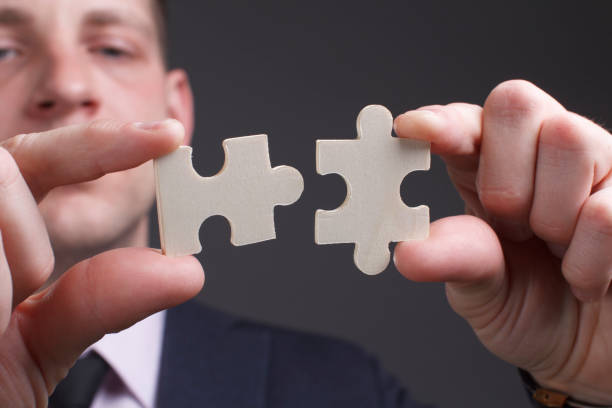 istock Young man thinks through the steps in business 1357589964