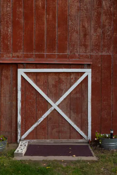 Red barn door vertical perspective.