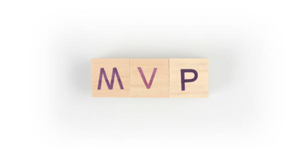 Cube with the letter from the mvp word back and bang. wooden cubes standing stock photo