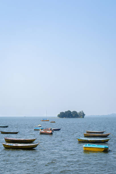 Boats in the upper lake at Bhopal which is also known as 'city of lakes'. Boats in the upper lake at Bhopal which is also known as 'city of lakes'. bhopal lake stock pictures, royalty-free photos & images