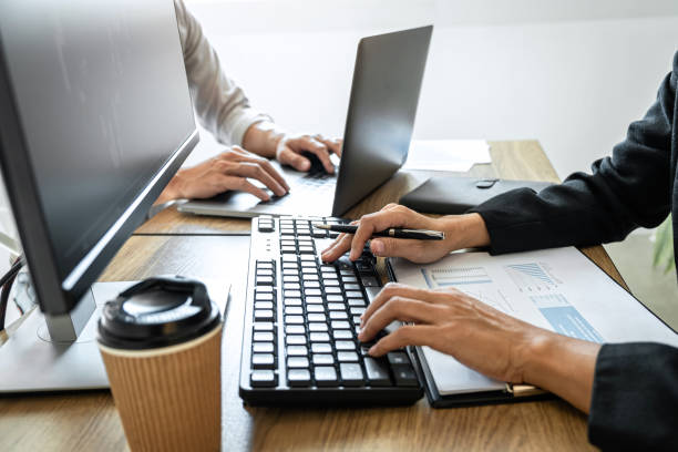 istock Business team investment working with computer, planning and analyzing graph stock market trading with stock chart data, business financial investment planning concept 1357606355