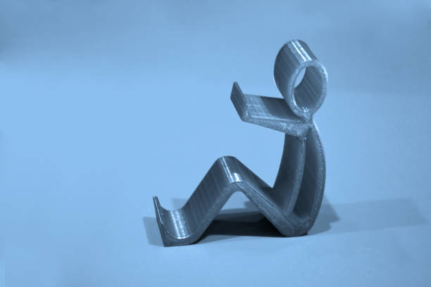 istock Abstract isolated object of a green color printed on a 3d printer on surface 1357607099