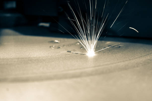 istock 3D printer printing metal. Laser sintering machine for metal. 1357607124