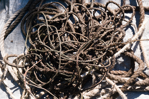 High resolution plaited rustic coarse Raffia mat detail background texture.