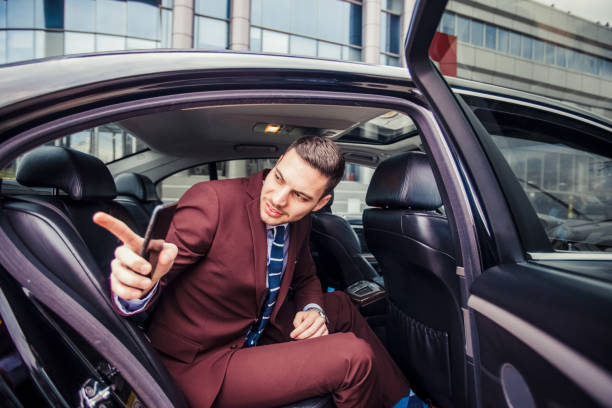 istock Businessman going out of his car 1357614106