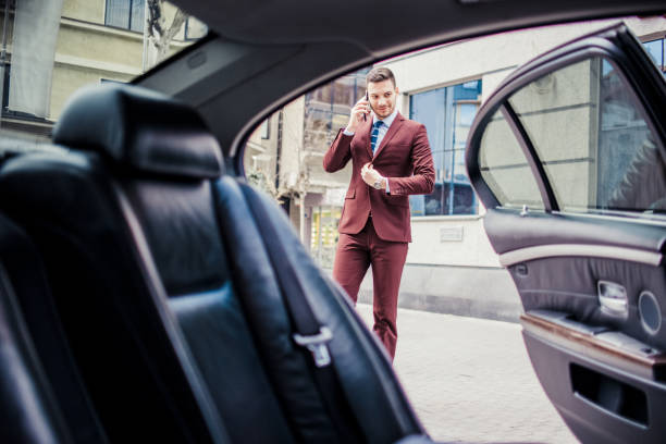 istock Rich businessman talking on cell phone 1357614157
