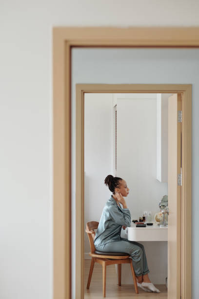 istock Woman Applying Skincare 1357615975