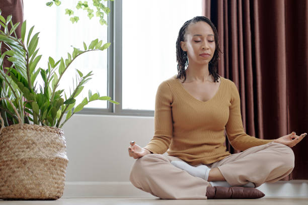 istock Woman Meditating to Stay Calm 1357615978